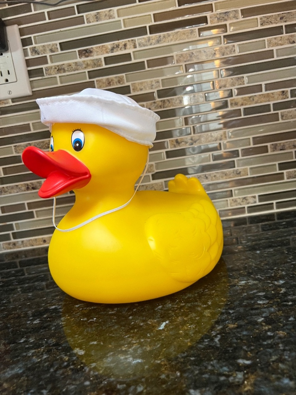 Large rubber duck with sailor hat